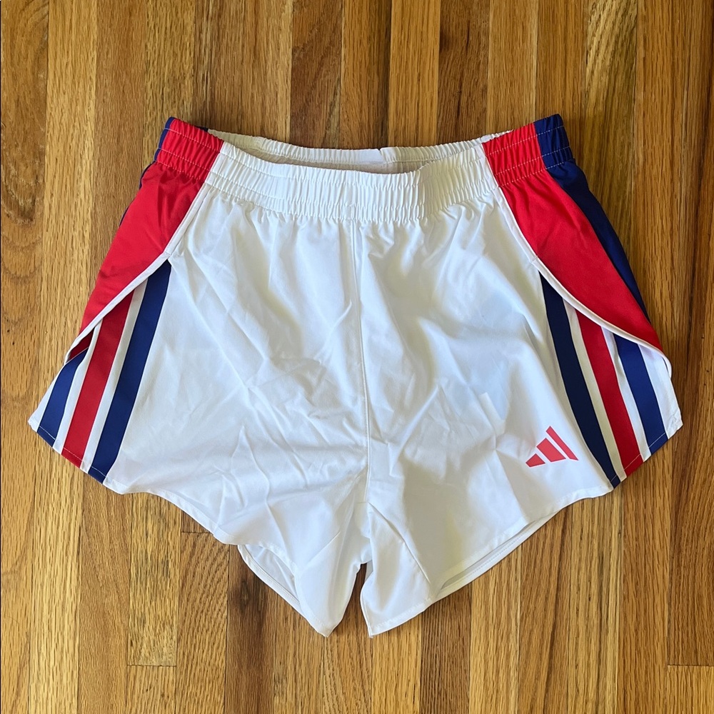 Adidas Women's White and Red Athletic Shorts with Blue Stripes